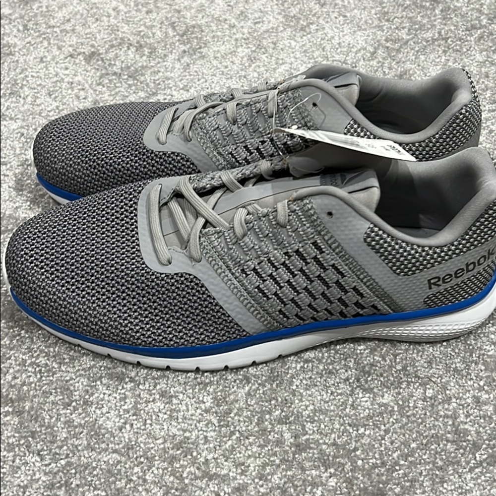 NWT; Men’s size 9.5 Reebok gray tennis shoes